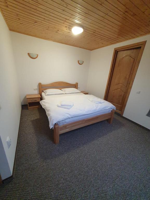 Postel nebo postele na pokoji v ubytování Casa Miruna & Noris