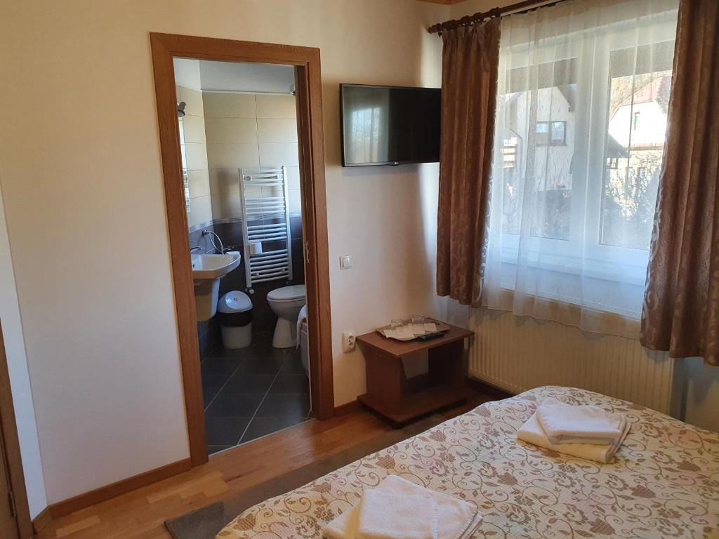 Postel nebo postele na pokoji v ubytování Casa Miruna & Noris