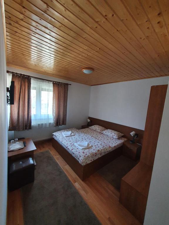 Postel nebo postele na pokoji v ubytování Casa Miruna & Noris
