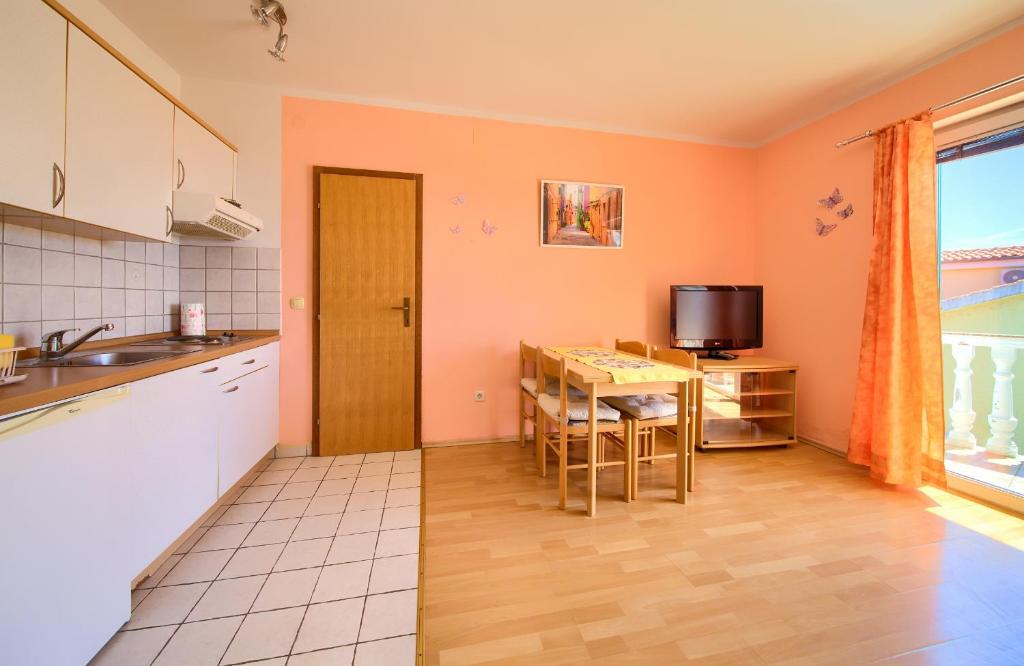 Kuchyň nebo kuchyňský kout v ubytování Apartment Henrik