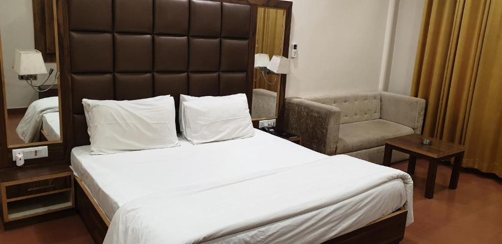 Postel nebo postele na pokoji v ubytování Hotel Pong View