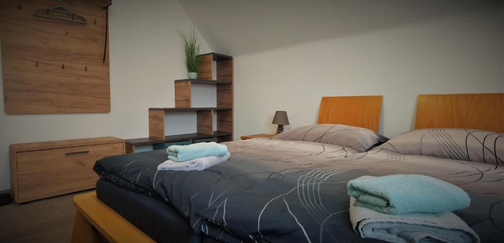 Postel nebo postele na pokoji v ubytování Haus im Seegebiet von Villach