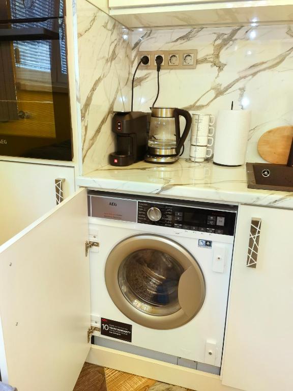 Kuchyň nebo kuchyňský kout v ubytování Sofiel cozy apartment - Top Center Sofia