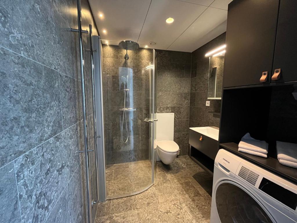 Koupelna v ubytování ÅhusBrygga Apartment Hotel