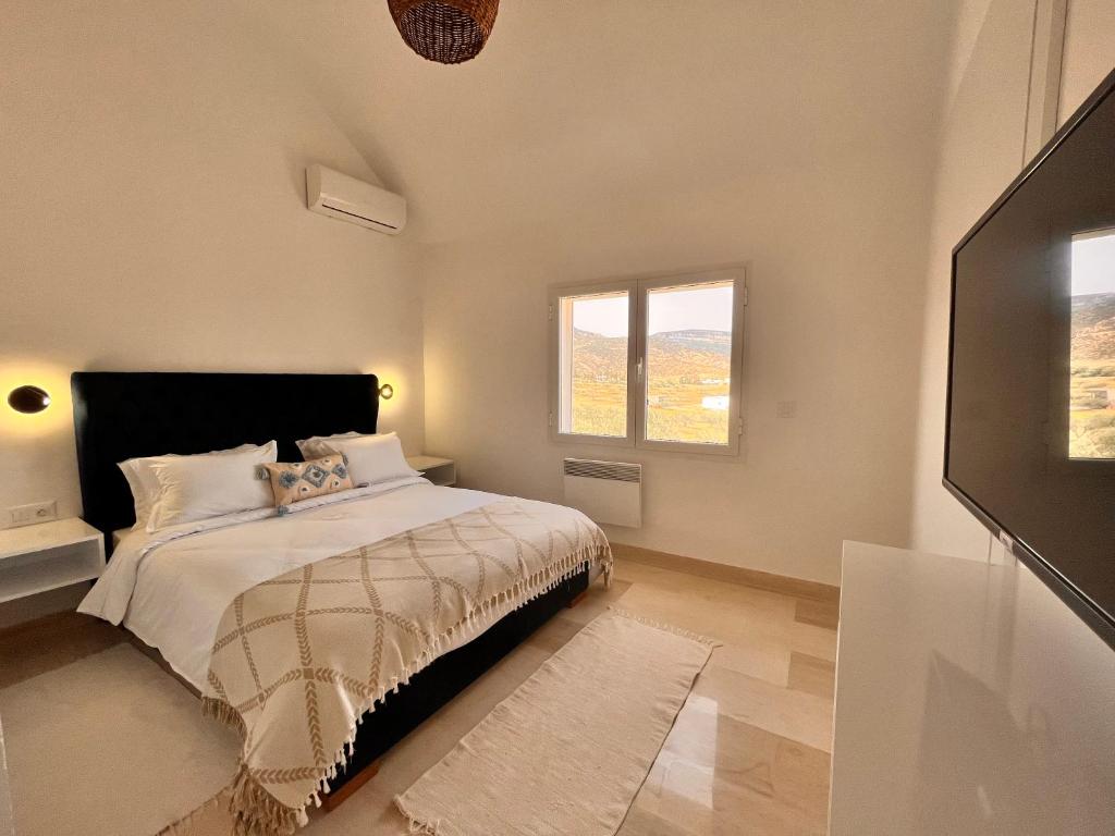Postel nebo postele na pokoji v ubytování Villa a la montagne Hammamet