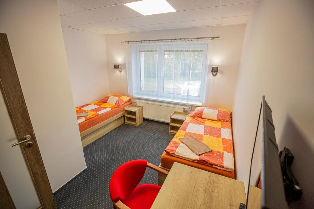Postel nebo postele na pokoji v ubytování Hotel Rabbit