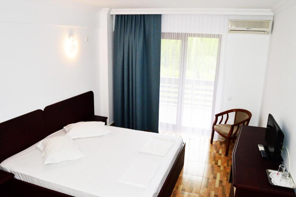 Postel nebo postele na pokoji v ubytování Puflene Resort