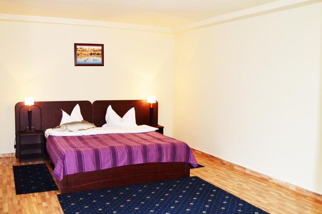 Postel nebo postele na pokoji v ubytování Puflene Resort