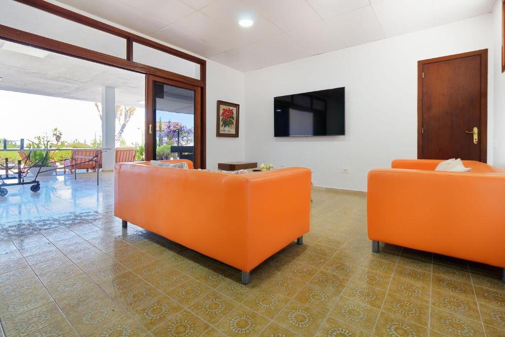 TV a/nebo společenská místnost v ubytování La Ideal Mansion by VillaGranCanaria