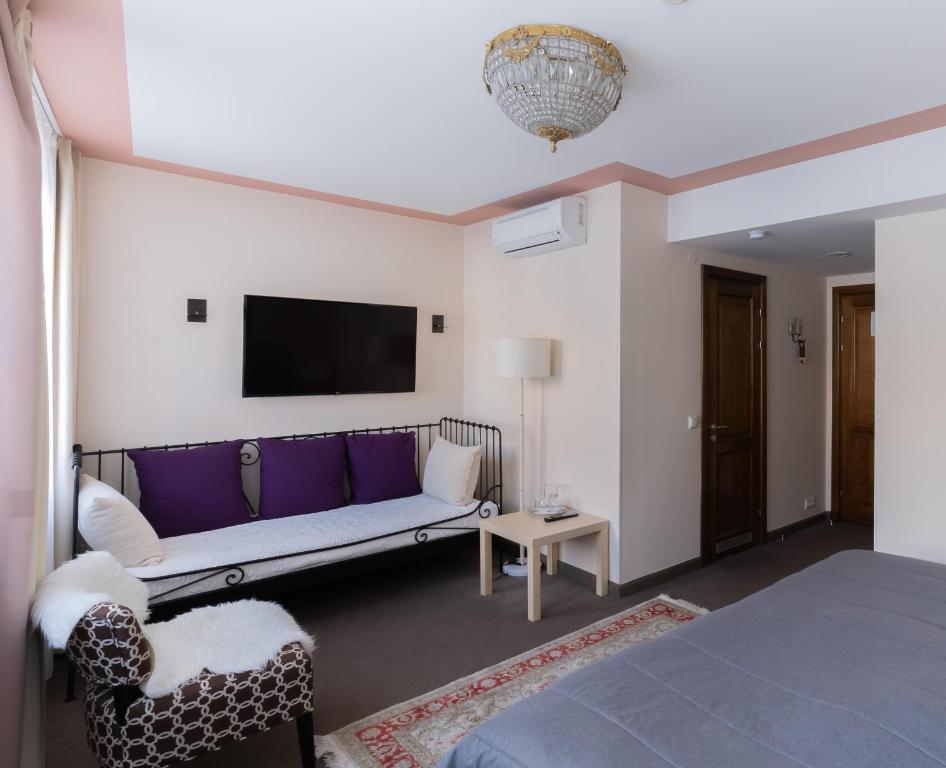 TV a/nebo společenská místnost v ubytování St. Peter's Boutique Hotel
