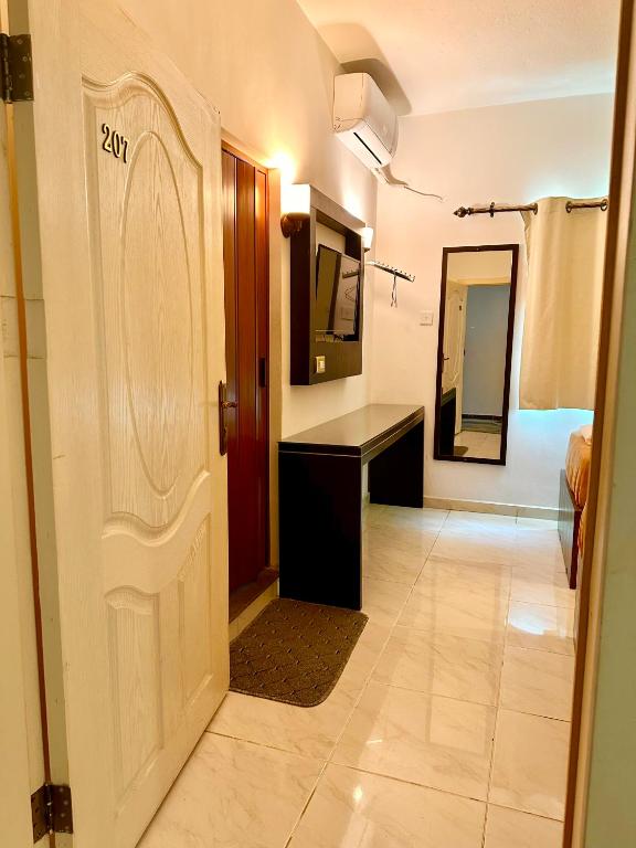 Kuchyň nebo kuchyňský kout v ubytování Petra Town Check-Inn