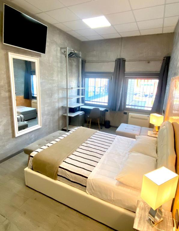 Postel nebo postele na pokoji v ubytování HOTEL TECH