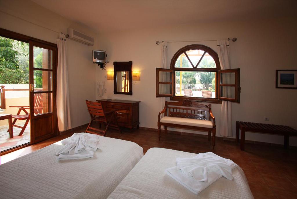 Postel nebo postele na pokoji v ubytování Sun Accommodation