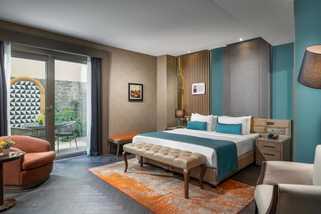 Postel nebo postele na pokoji v ubytování Aspera Hotel Altunizade