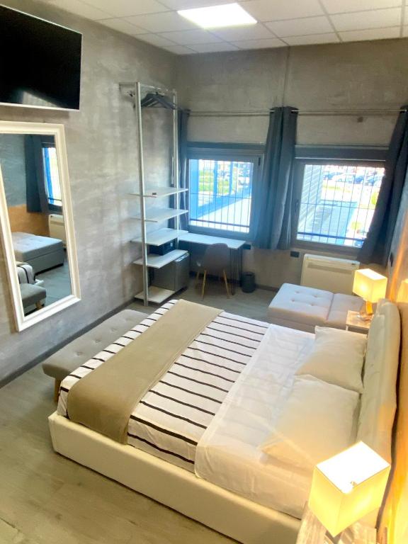 Postel nebo postele na pokoji v ubytování HOTEL TECH
