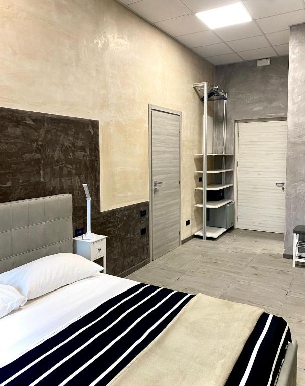 Postel nebo postele na pokoji v ubytování HOTEL TECH