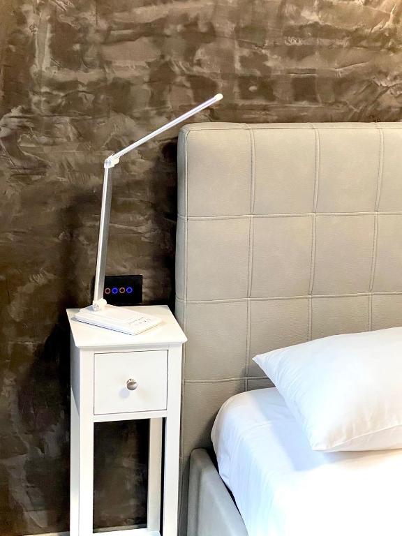 Postel nebo postele na pokoji v ubytování HOTEL TECH