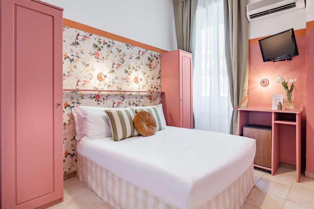 Postel nebo postele na pokoji v ubytování Hotel Espana - Gruppo BLAM HOTELS