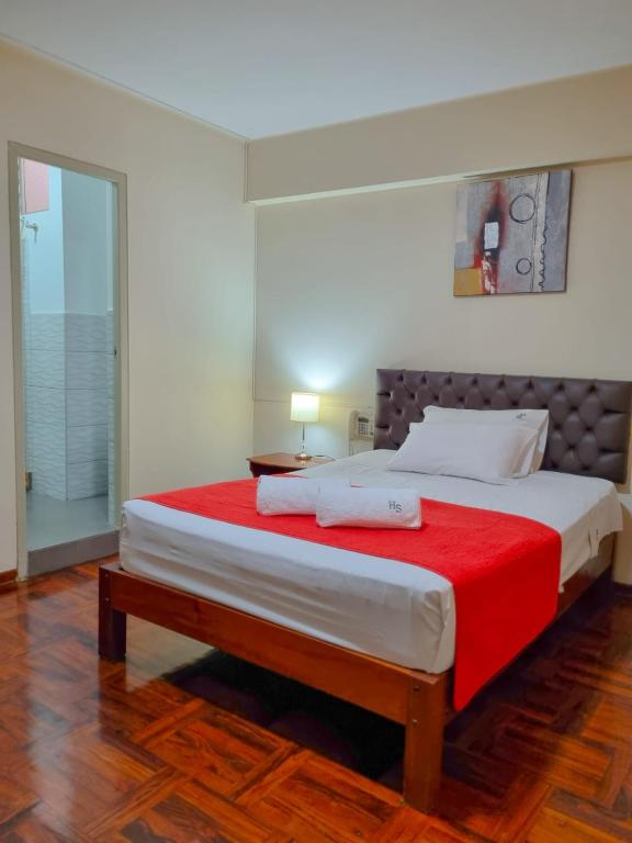 Postel nebo postele na pokoji v ubytování Hostal Solari