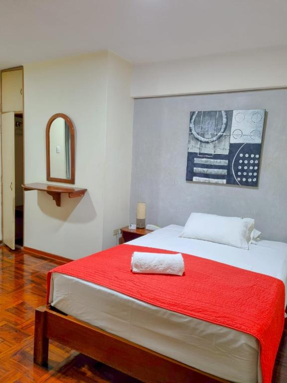 Postel nebo postele na pokoji v ubytování Hostal Solari