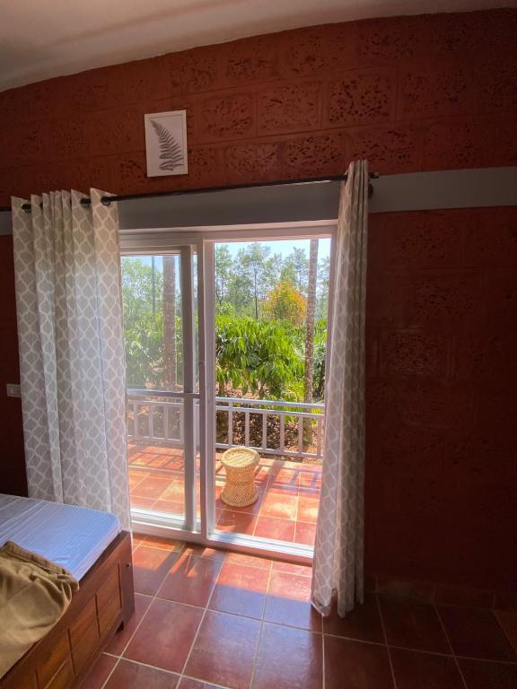 Postel nebo postele na pokoji v ubytování FernHills Homestay