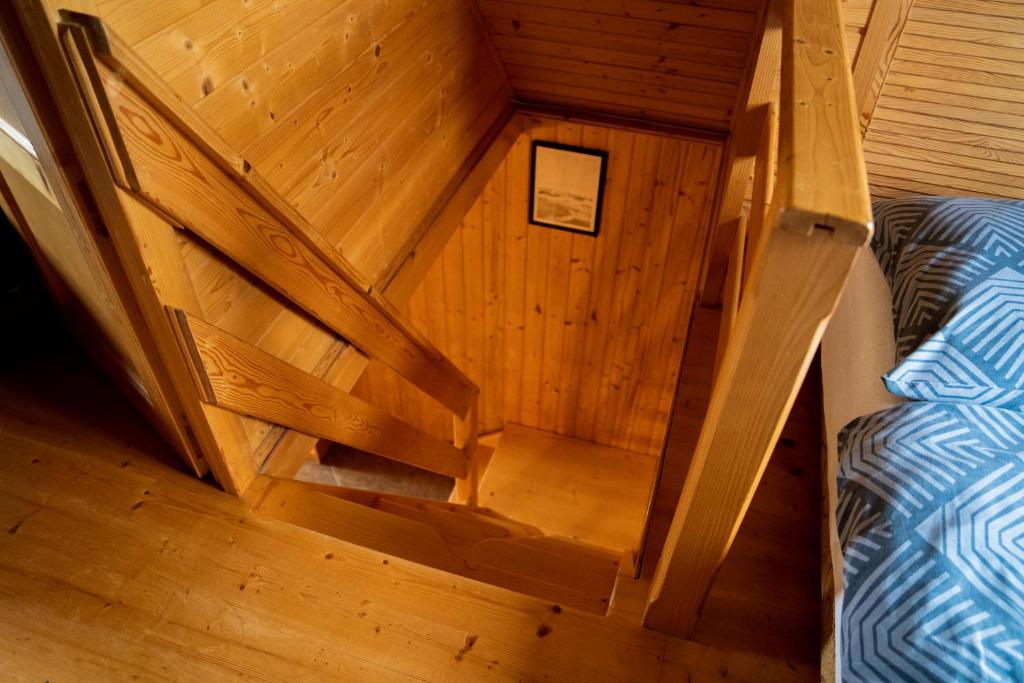 Postel nebo postele na pokoji v ubytování Domki nad jeziorem-Wodnik