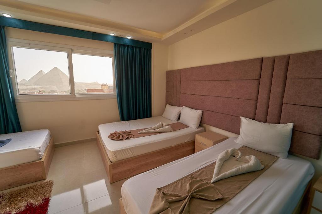 Gardenia Inn - Suite De Luxe Avec Vue Pyramides