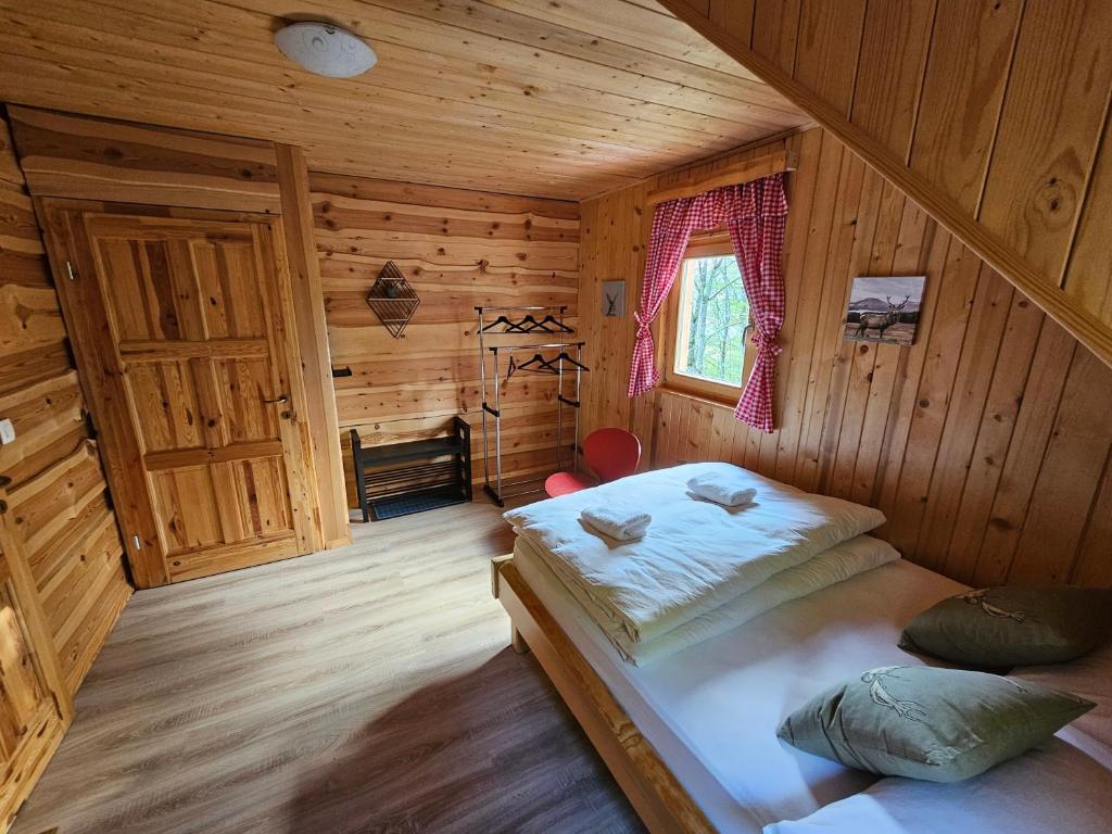 Postel nebo postele na pokoji v ubytování Koča na Taležu