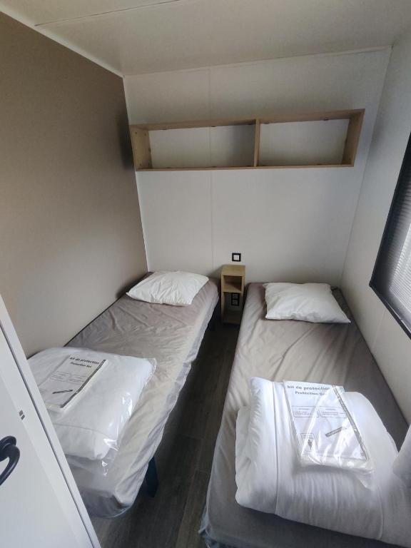 Postel nebo postele na pokoji v ubytování La cabane de la falaise