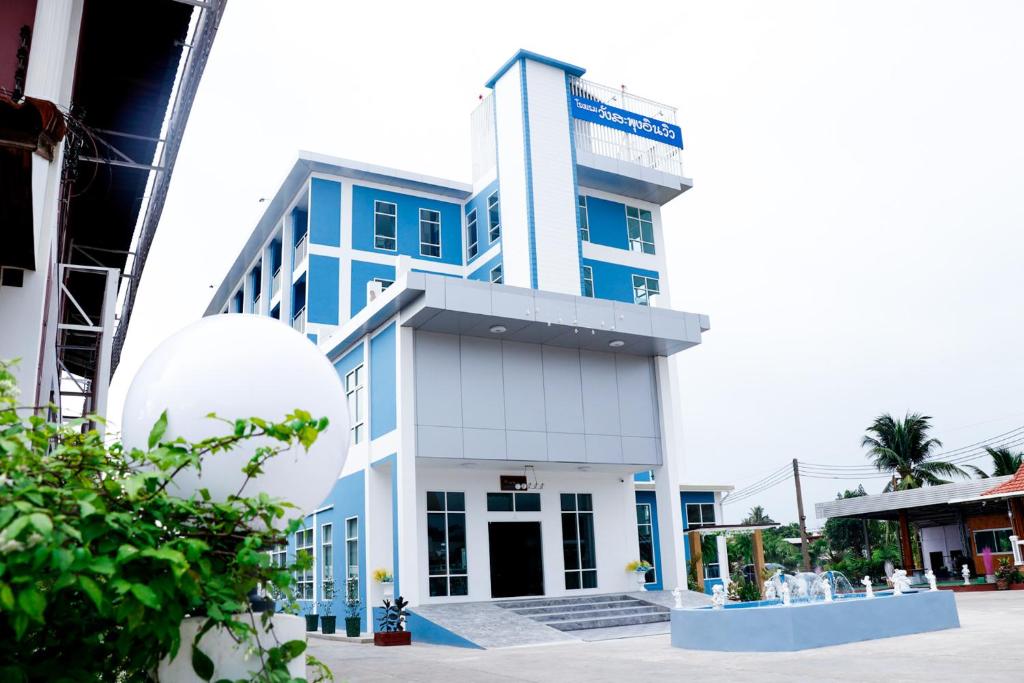 a tall blue building with a satellite at โรงเเรมวังสะพุงอินวิว in Loei