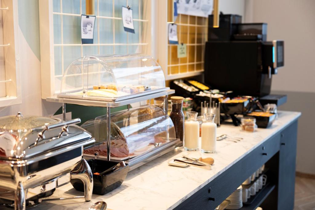 Kuchyň nebo kuchyňský kout v ubytování B&B HOTEL Mechelen
