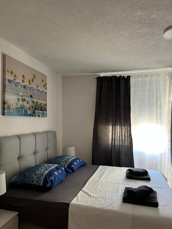 Postel nebo postele na pokoji v ubytování Apartments Graz