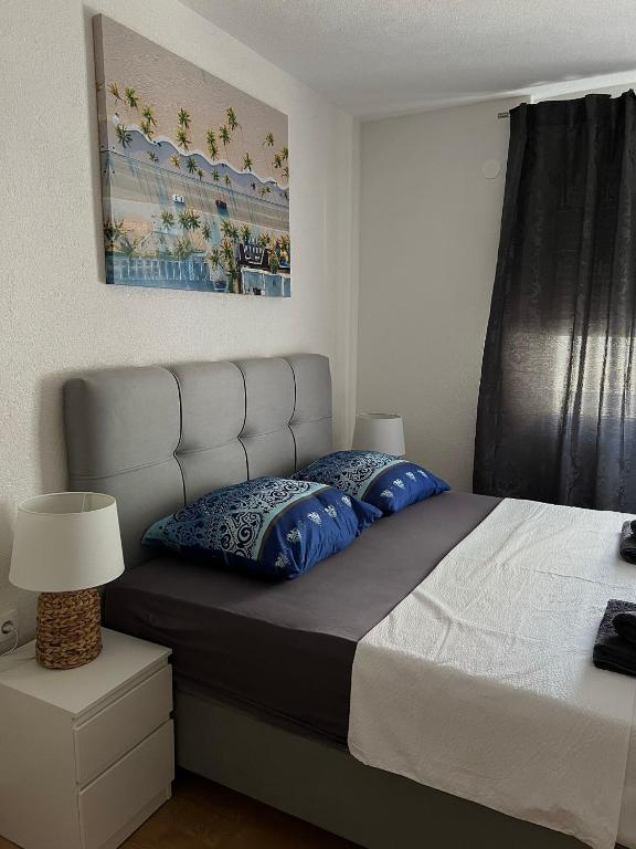 Postel nebo postele na pokoji v ubytování Apartments Graz