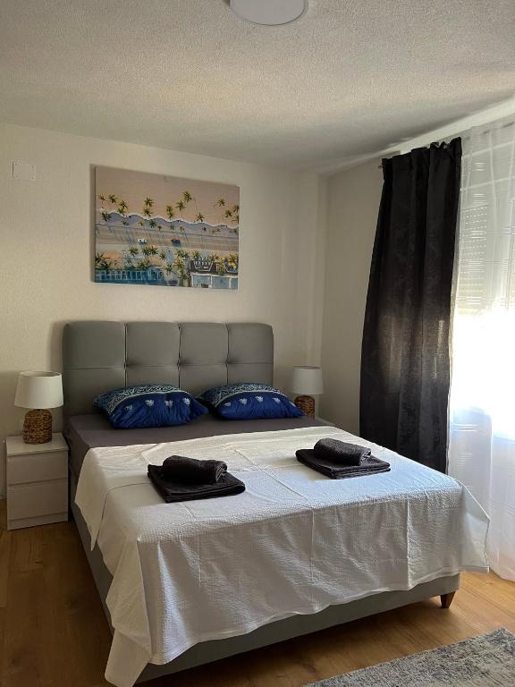 Postel nebo postele na pokoji v ubytování Apartments Graz