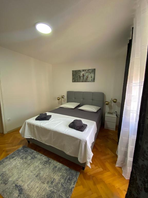 Postel nebo postele na pokoji v ubytování Apartments Graz