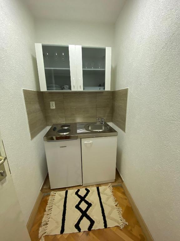 Kuchyň nebo kuchyňský kout v ubytování Apartments Graz