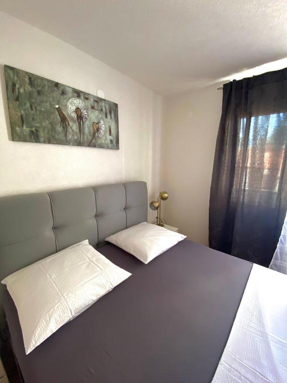 Postel nebo postele na pokoji v ubytování Apartments Graz