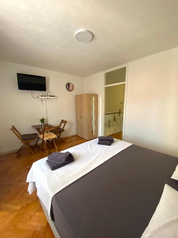 Postel nebo postele na pokoji v ubytování Apartments Graz