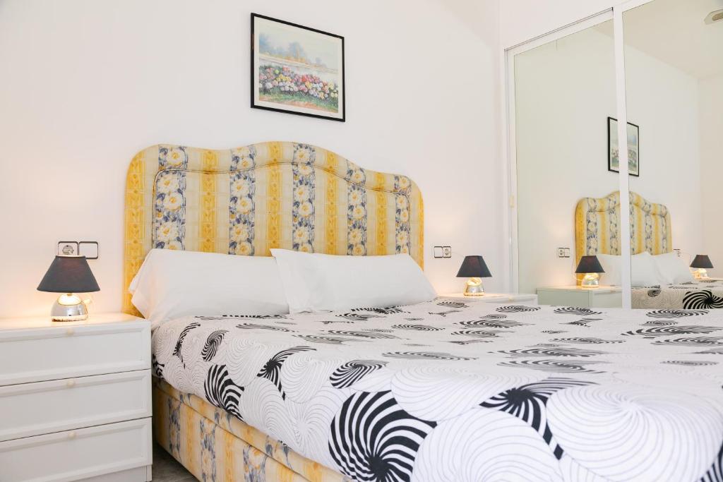 Postel nebo postele na pokoji v ubytování VILLA ADELAIDA