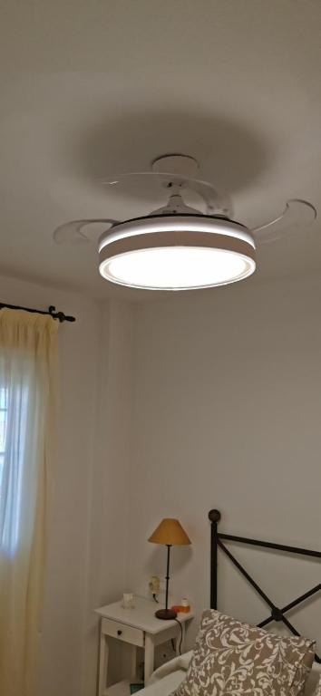 Łóżko lub łóżka w pokoju w obiekcie APARTAMENTO CASARES PLAYA
