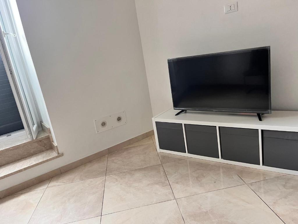 TV a/nebo společenská místnost v ubytování Esse House's Noto