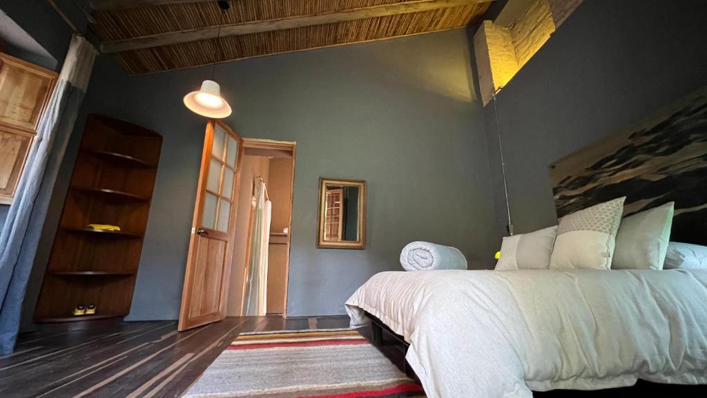Postel nebo postele na pokoji v ubytování Hotel Dios