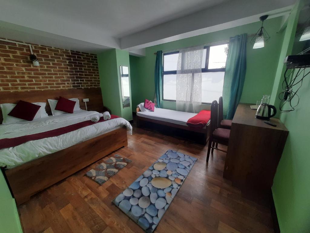Postel nebo postele na pokoji v ubytování Bubble Beds