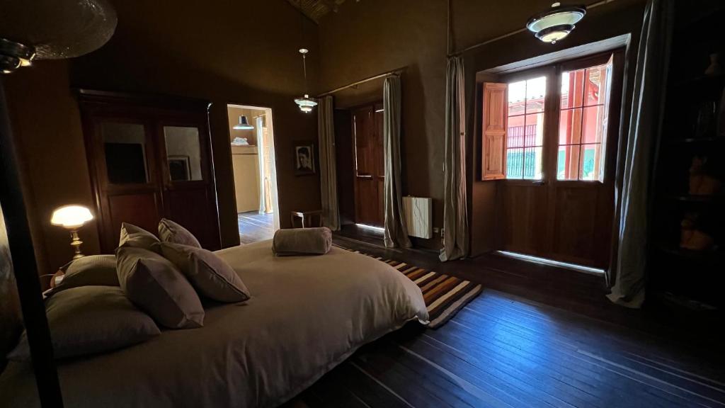 Postel nebo postele na pokoji v ubytování Hotel Dios