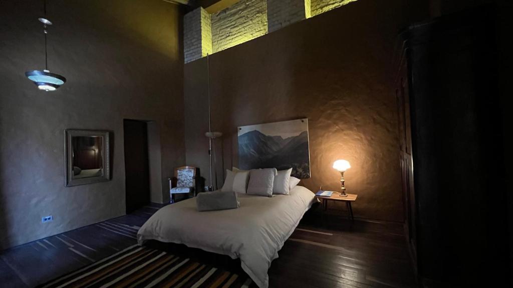 Postel nebo postele na pokoji v ubytování Hotel Dios