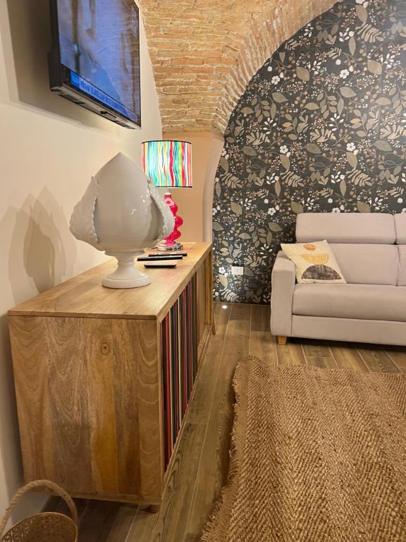 TV a/nebo společenská místnost v ubytování Le Dimore Del Gufo - Royal Suite