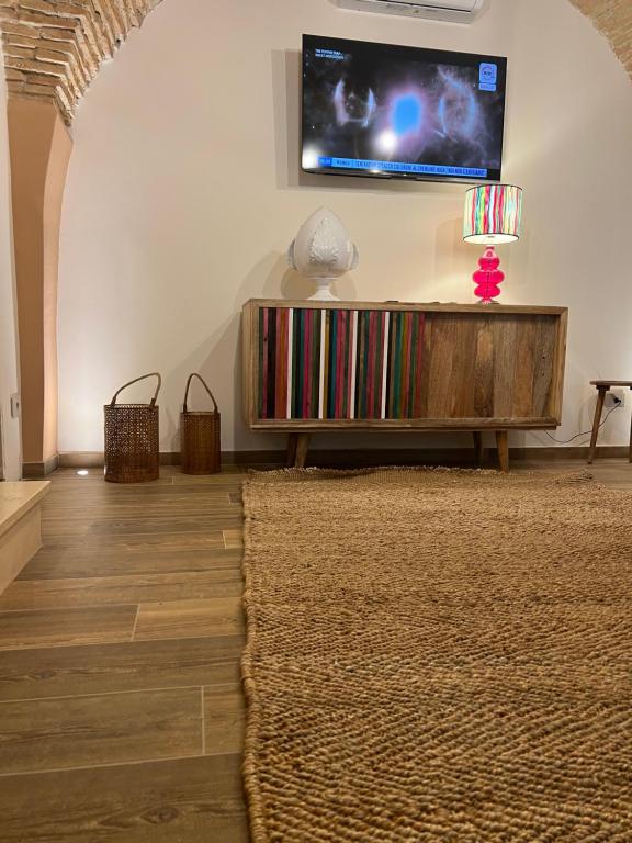 TV a/nebo společenská místnost v ubytování Le Dimore Del Gufo - Royal Suite