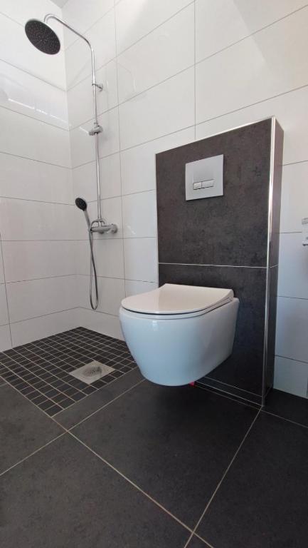 Koupelna v ubytování Anesi Suites & Rooms