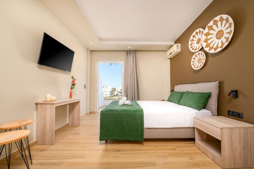 Postel nebo postele na pokoji v ubytování Nicolas Grand Suites, Adults Only