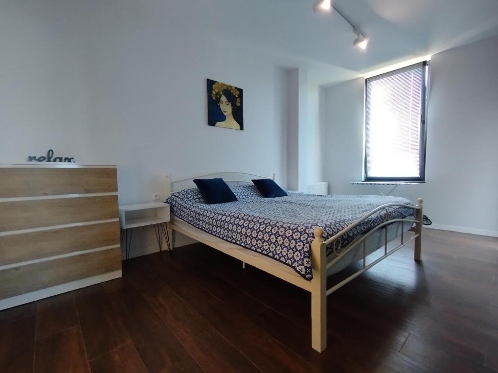Llit o llits en una habitació de Boutique Hotel Sleep and Wine